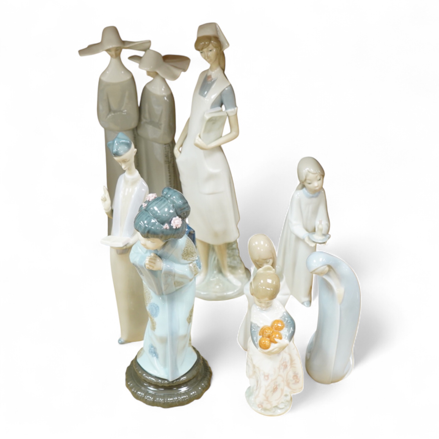 A group of Lladro figures - two Nuns, Geisha, Priest, Virgin Mary, Orange Girl with candle, Girl praying (8) tallest Nuns 33cm high